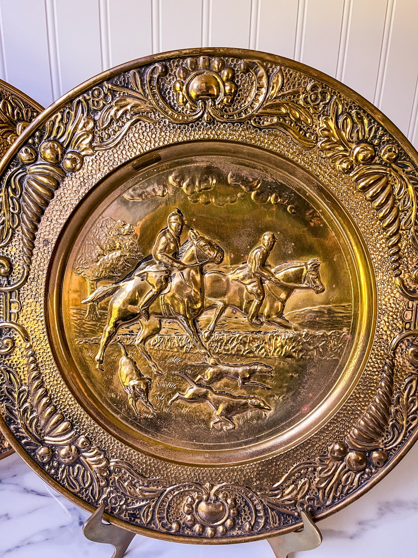 Pair of Embossed Hunt Scene Brass Plates