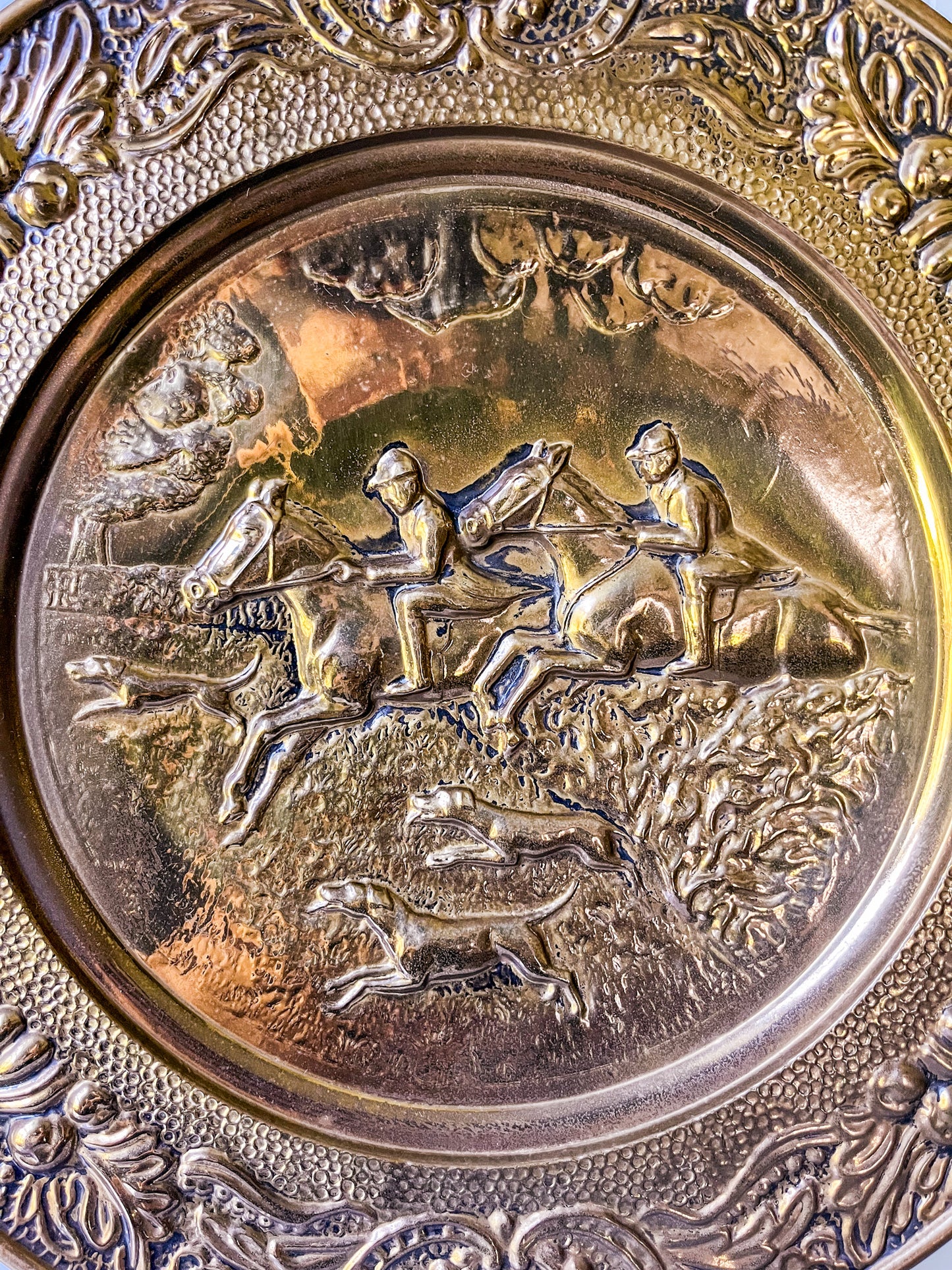 Pair of Embossed Hunt Scene Brass Plates